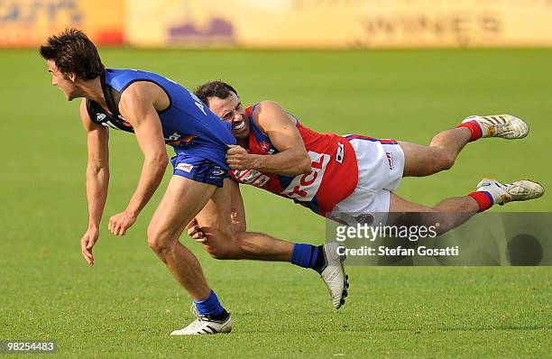 Joel Rice of West Perth tackles Brendan Lee of East Perth during the round three WAFL match between East Perth and West Perth at Medibank Stadium on...