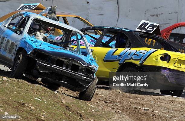 Cars collide as they compete in one of the 2-litre National Bangers Heat races at the United Downs Raceway banger racing meet in St Day near Redruth...
