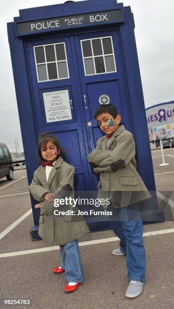 Sonali Patel and Priya Patel as Mini Matt Smiths desend upon Toys R Us to be the first to buy the new 11th Doctor Who action figure at Brent Cross...