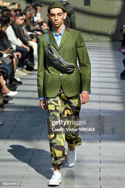 Model walks the runway during the Junya Watanabe Man Menswear Spring/Summer 2019 fashion show as part of Paris Fashion Week on June 22, 2018 in...