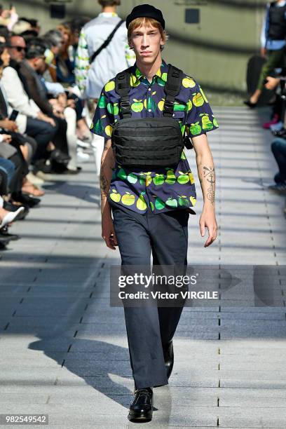 Model walks the runway during the Junya Watanabe Man Menswear Spring/Summer 2019 fashion show as part of Paris Fashion Week on June 22, 2018 in...