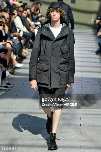 Model walks the runway during the Junya Watanabe Man Menswear Spring/Summer 2019 fashion show as part of Paris Fashion Week on June 22, 2018 in...