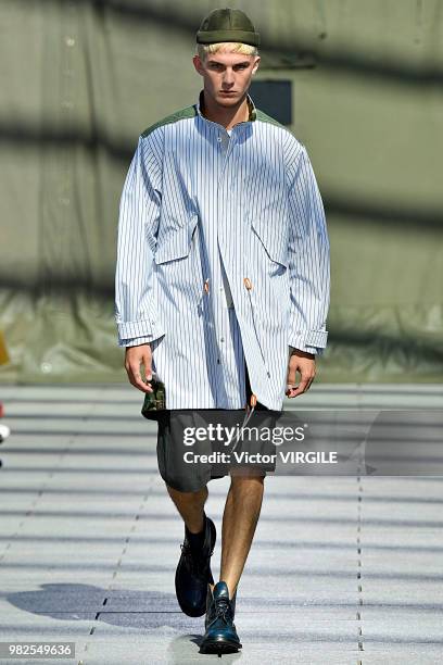 Model walks the runway during the Junya Watanabe Man Menswear Spring/Summer 2019 fashion show as part of Paris Fashion Week on June 22, 2018 in...