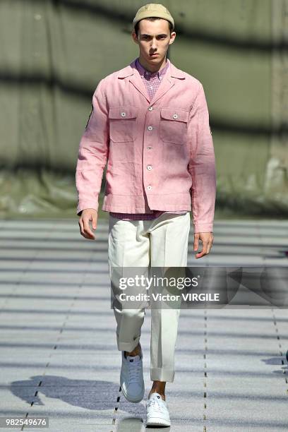 Model walks the runway during the Junya Watanabe Man Menswear Spring/Summer 2019 fashion show as part of Paris Fashion Week on June 22, 2018 in...