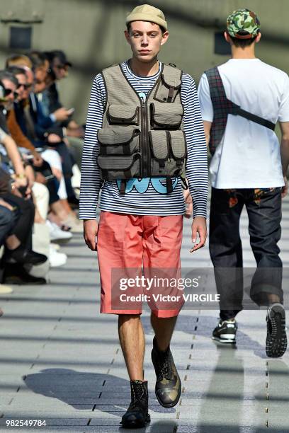 Model walks the runway during the Junya Watanabe Man Menswear Spring/Summer 2019 fashion show as part of Paris Fashion Week on June 22, 2018 in...