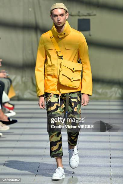 Model walks the runway during the Junya Watanabe Man Menswear Spring/Summer 2019 fashion show as part of Paris Fashion Week on June 22, 2018 in...