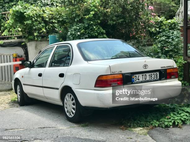 classic toyata corolla car parked on the street of istanbul - toyata stock pictures, royalty-free photos & images