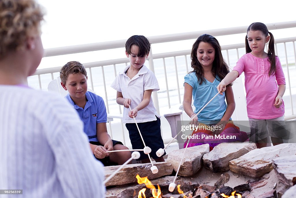 Kids roasting marsh mellows