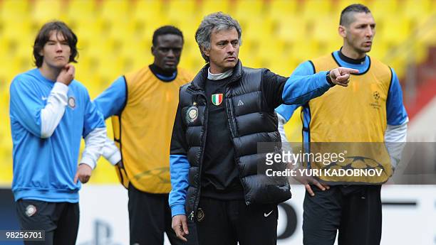 Inter Milan's Portuguese coach Jose Mourinho gestures during their official training session on the eve of their second leg Quarter final match...