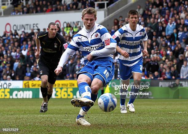 Simon Church of Reading scores from the penalty spot during the Coca Cola Championship game between Reading and Coventry City at The Madejski Stadium...