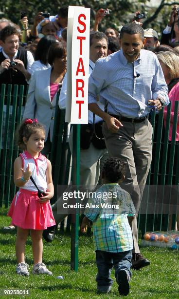 President Barack Obama interacts with children during the annual White House Easter Egg Roll at the South Lawn April 5, 2010 in Washington, DC. The...