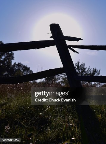 PICKETT FENCE SILHOUETTE AT SUNSET