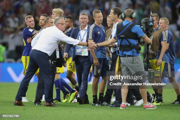 Oliver Bierhoff team manager of Germany reacts to Janne Andersson, head coach of Sweden at the field of play after the 2018 FIFA World Cup Russia...