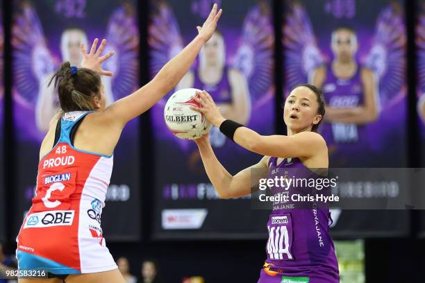 Caitlyn Nevins of the Firebirds passes during the round eight Super Netball match between the Firebirds and the Swifts at Brisbane Entertainment...