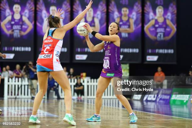 Caitlyn Nevins of the Firebirds passes during the round eight Super Netball match between the Firebirds and the Swifts at Brisbane Entertainment...