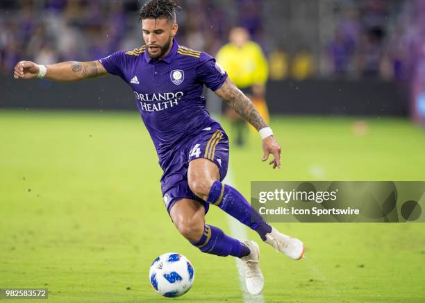 Orlando City forward Dom Dwyer keeps the ball from going out During the MLS soccer match between the Orlando City SC and Montreal Impact on June...