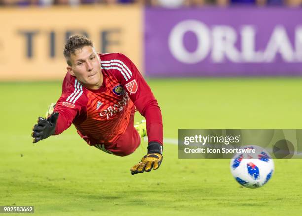 Orlando City goalkeeper Joseph Bendik dives for the ball During the MLS soccer match between the Orlando City SC and Montreal Impact on June 23rd,...