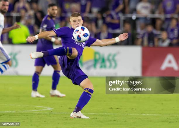 Orlando City forward Chris Mueller shoots the ball from a side volly During the MLS soccer match between the Orlando City SC and Montreal Impact on...