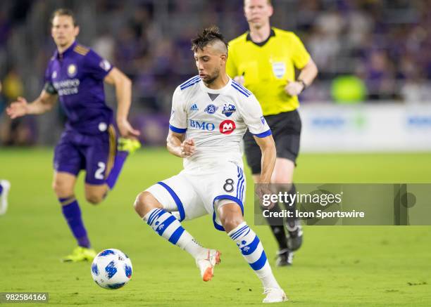 Montreal Impact midfielder Saphir Taider makes a pass During the MLS soccer match between the Orlando City SC and Montreal Impact on June 23rd, 2018...