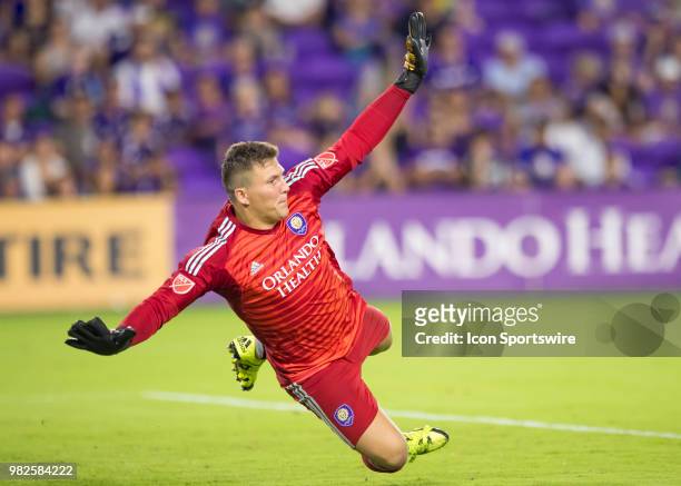 Orlando City goalkeeper Joseph Bendik dives for the ball During the MLS soccer match between the Orlando City SC and Montreal Impact on June 23rd,...