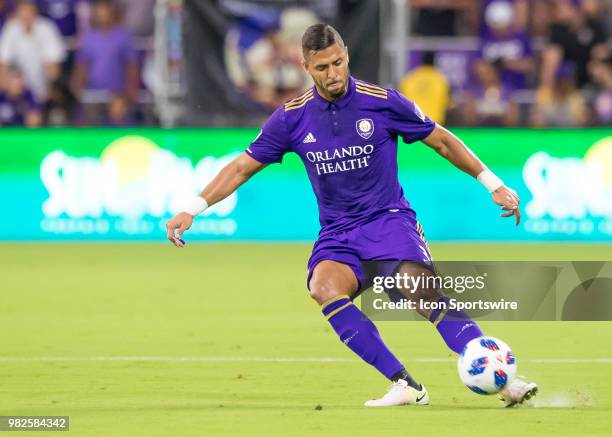 Orlando City defender Amro Tarek passes the ball During the MLS soccer match between the Orlando City SC and Montreal Impact on June 23rd, 2018 at...