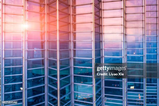 building reflection - xie liyao stock pictures, royalty-free photos & images