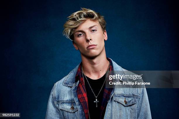 Cameron Huff poses for a portrait at the Getty Images Portrait Studio at the 9th Annual VidCon US at Anaheim Convention Center on June 22, 2018 in...