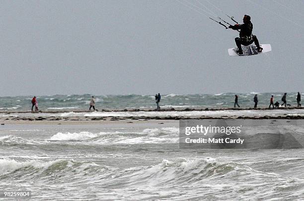 Kite surfers enjoy the windy weather in Mount's Bay near St Michael's Mount near Penzance on April 5, 2010 in Cornwall, United Kingdom. Many people...