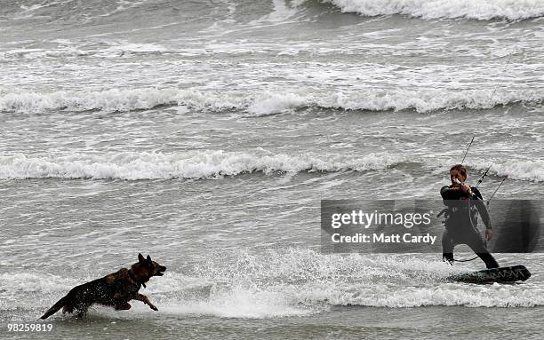 Kite surfers enjoy the windy weather in Mount's Bay near St Michael's Mount near Penzance on April 5, 2010 in Cornwall, United Kingdom. Many people...