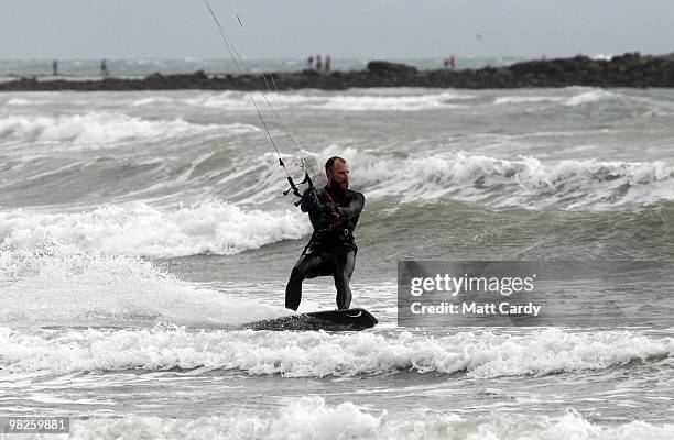 Kite surfers enjoy the windy weather in Mount's Bay near St Michael's Mount near Penzance on April 5, 2010 in Cornwall, United Kingdom. Many people...