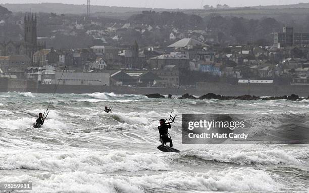 Kite surfers enjoy the windy weather in Mount's Bay near St Michael's Mount near Penzance on April 5, 2010 in Cornwall, United Kingdom. Many people...