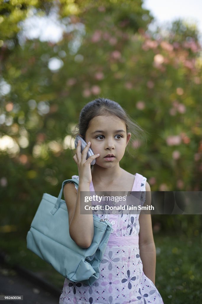 Girl with toy telephone