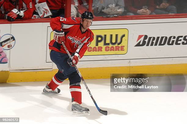 Jason Chimera of the Washington Capitals skates with the puck during a NHL hockey game against the Ottawa Senators on March 30, 2010 at the Verizon...