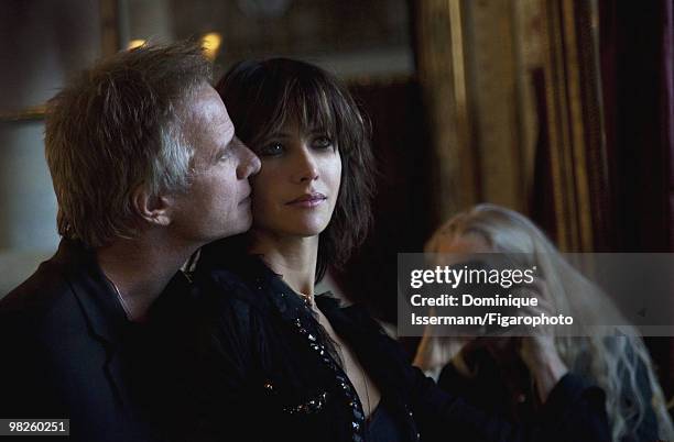 Actors and couple Sophie Marceau and Christopher Lambert , behind the scenes of a portrait session for Madame Figaro Magazine in Paris in 2009 with...