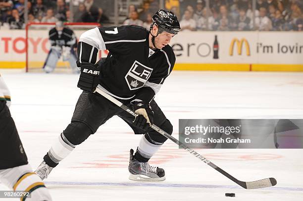 Rob Scuderi of the Los Angeles Kings skates with the puck against the Dallas Stars on March 27, 2010 at Staples Center in Los Angeles, California.