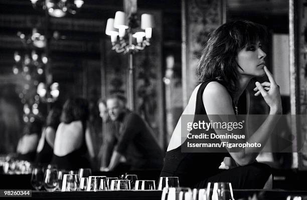 Actors and couple Sophie Marceau and Christopher Lambert at a portrait session for Madame Figaro Magazine in Paris in 2009. Shot at restaurant Le...