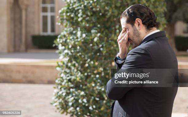 Lebanese Prime Minister Saad Hariri wats for the arrival of German President Frank-Walter steinmeier at the Government Palace in Beirut, Lebanon, 30...