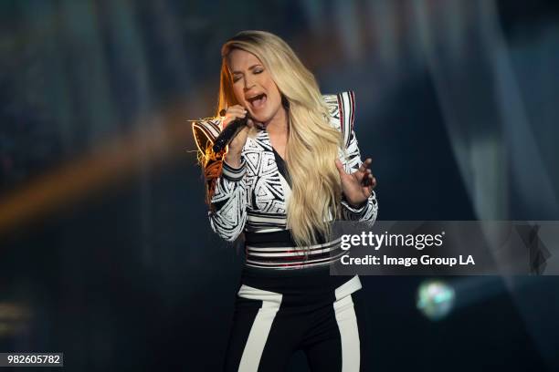 Multi-platinum superstars Carrie Underwood and Ludacris performed their hit song "The Champion," live for the first time, at the 2018 Radio Disney...