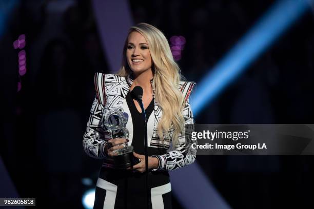 Seven-time Grammy Award-winning artist Carrie Underwood was honored with the 2018 RDMA 'Hero' Award in recognition of her generosity, humanitarian...
