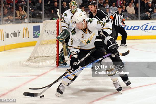 Stephane Robidas of the Dallas Stars skates with the puck against the Los Angeles Kings on March 27, 2010 at Staples Center in Los Angeles,...