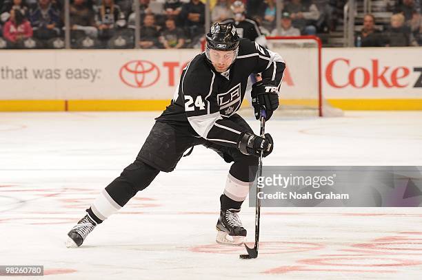 Alexander Frolov of the Los Angeles Kings skates with the puck against the Dallas Stars on March 27, 2010 at Staples Center in Los Angeles,...