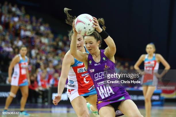 Caitlyn Nevins of the Firebirds catches during the round eight Super Netball match between the Firebirds and the Swifts at Brisbane Entertainment...