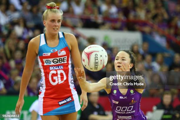 Caitlyn Nevins of the Firebirds passes during the round eight Super Netball match between the Firebirds and the Swifts at Brisbane Entertainment...