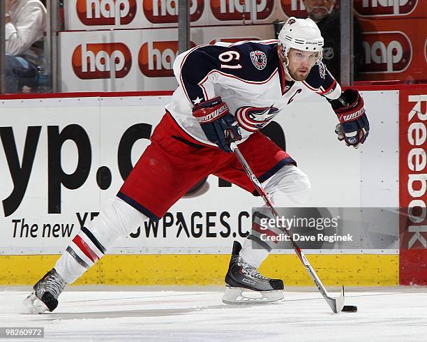 Rick Nash of the Columbus Blue Jackets skates with the puck during an NHL game against the Detroit Red Wings at Joe Louis Arena on April 1, 2010 in...