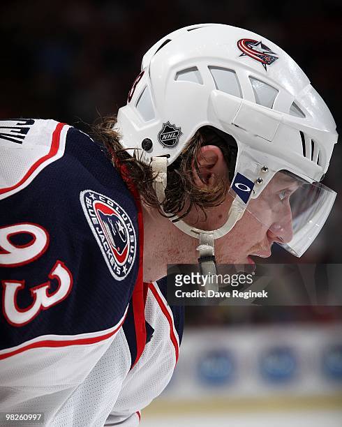 Jakub Voracek of the Columbus Blue Jackets gets set for a face-off during an NHL game against the Detroit Red Wings at Joe Louis Arena on April 1,...