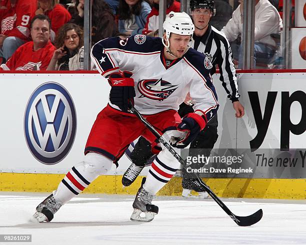 Marc Methot of the Columbus Blue Jackets skates with the puck during an NHL game against the Detroit Red Wings at Joe Louis Arena on April 1, 2010 in...