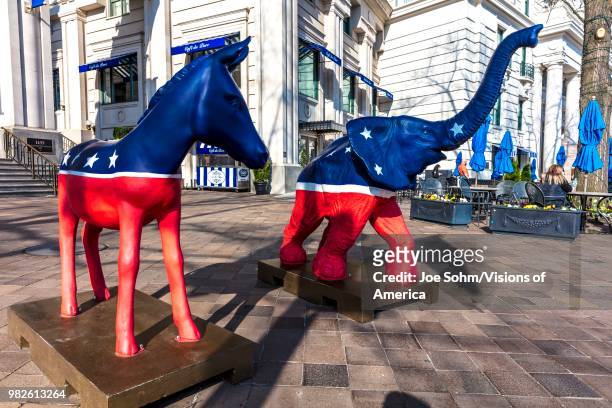 Democratic Mule and Republican Elephant statues symbolize American 2-part Political system in front of Willard Hotel.