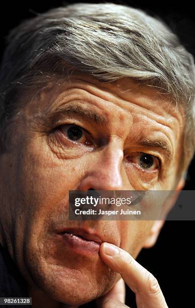 Head coach Arsene Wenger of Arsenal listens to questions from the media during a press conference ahead of their UEFA Champions League quarter final...