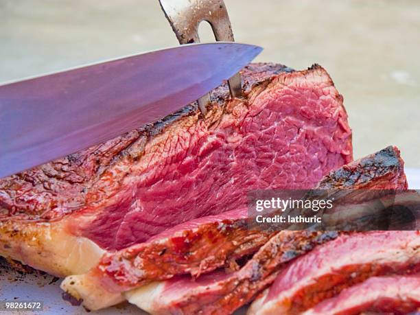 carving prime beef - carving set stock pictures, royalty-free photos & images