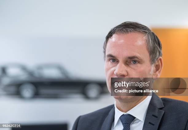 Oliver Blume, CEO of German automobile company Porsche, speaks in his office in Stuttgart, Germany, 29 January 2018. Photo: Sebastian Gollnow/dpa